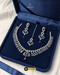 Signature Royal Blue Sapphire Necklace Set with Teeka and Earrings in a luxury blue velvet box.