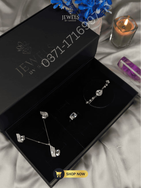 Premium Jewels by Sarah black gift box containing a full silver jewelry set.