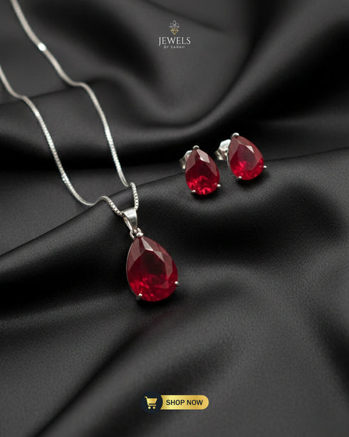 Deep ruby red teardrop necklace set for party wear.