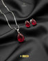 Deep ruby red teardrop necklace set for party wear.