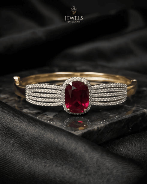 Ruby red zircon statement bangle bracelet on dark marble – Jewels by Sarah