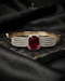 Ruby red zircon statement bangle bracelet on dark marble – Jewels by Sarah