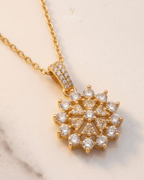 Gold polish diamond-cut flower zircon pendant necklace close-up – Jewels by Sarah