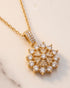 Gold polish diamond-cut flower zircon pendant necklace close-up – Jewels by Sarah