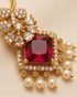 Close-up of square-cut ruby pendant with AD stones and pearl drops in 22K gold polish - Jewels by Sarah Signature Collection