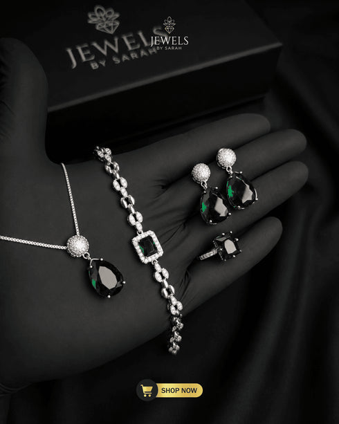 Regal emerald green zircon matching jewelry set with pendant and bracelet jewels by sarah