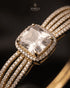 Close-up of clear zircon center stone with pave halo detailing – Jewels by Sarah