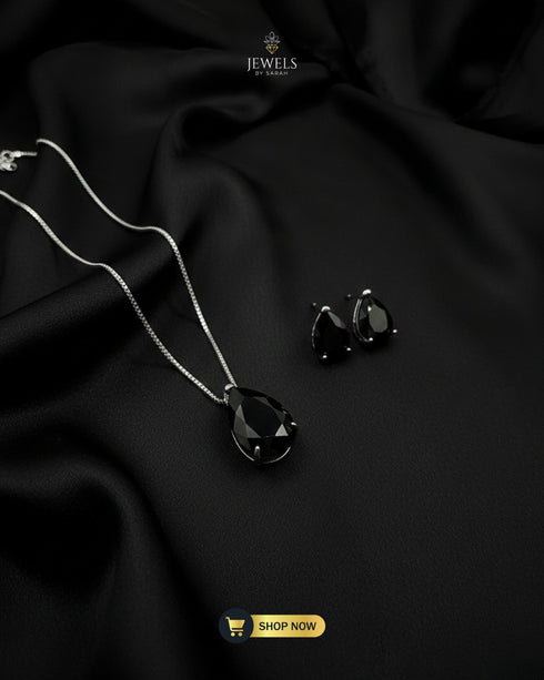 Sophisticated black teardrop pendant jewelry set for office wear.
