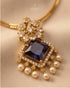 Close-up of 22K gold polish South Indian mauve square kundan pendant with pearl drops - Jewels by Sarah Signature Collection