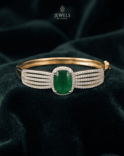 Emerald green zircon statement bangle bracelet on dark green velvet – Jewels by Sarah