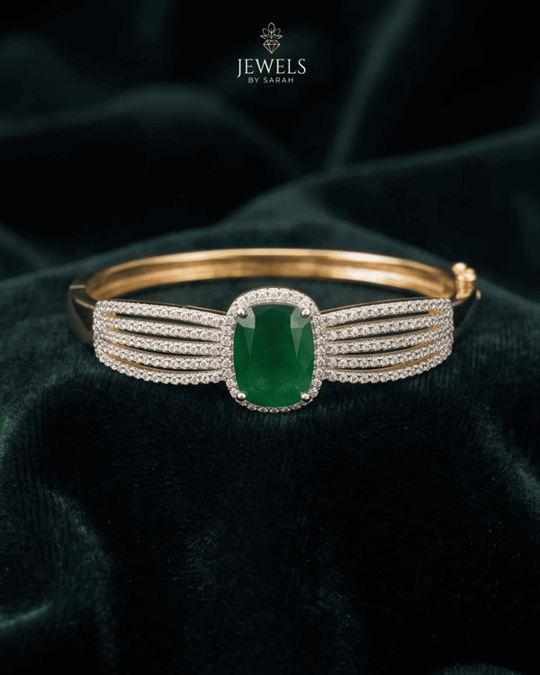 Emerald green zircon statement bangle bracelet on dark green velvet – Jewels by Sarah