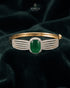Emerald green zircon statement bangle bracelet on dark green velvet – Jewels by Sarah