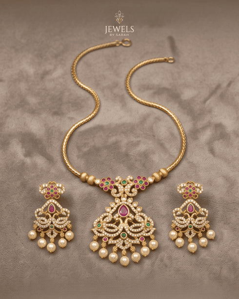 South Indian kemp peacock necklace with pearl drops laid flat on fabric - Jewels by Sarah Signature Collection