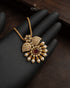 South Indian temple jewelry pendant with kemp stone and pearls held in hand - Jewels by Sarah Signature Collection