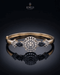 Gold sapphire sunburst medallion bangle bracelet on reflective black surface – Jewels by Sarah