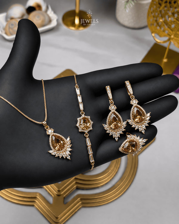 "Champagne gold marquise sunburst jewelry set with necklace, bracelet, earrings and ring"