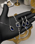 "Sapphire blue teardrop pearl halo jewelry set with necklace, bracelet, earrings and ring"
