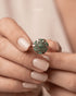 "Model wearing emerald cluster gold plated statement ring by Jewels by Sarah"