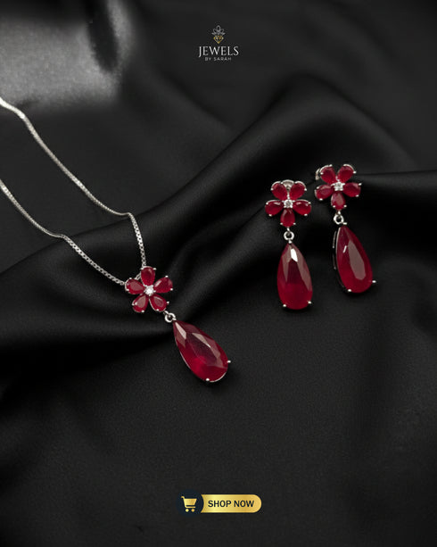 Ruby red zircon pendant and earring set for bridal and party wear.