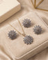 Jurao stone starburst necklace and earrings set on velvet box with Jewels by Sarah branding - 22K gold polish