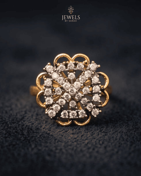 "Crystal floral gold plated ring with scalloped design on dark fabric by Jewels by Sarah"