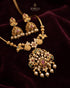 "South Indian temple jewelry set with jhumka earrings on maroon velvet by Jewels by Sarah"