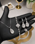 "Clear crystal teardrop pearl halo jewelry set with necklace, bracelet, earrings and ring"