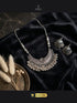 Vintage Style Silver Jewelry Set on Black Velvet Background.