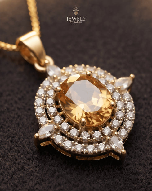 Close-up of champagne jurao stone pendant with AD stone double halo in 22K gold polish - Jewels by Sarah