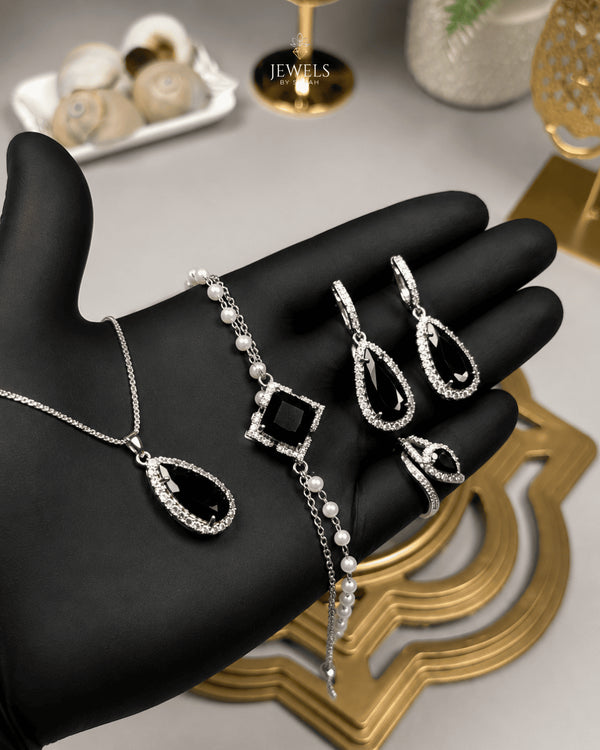 "Jet black teardrop pearl halo jewelry set with necklace, bracelet, earrings and ring"