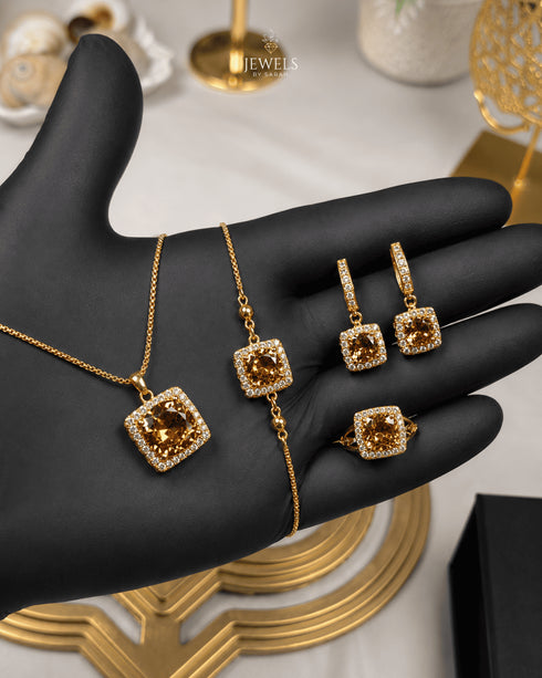 "Champagne gold halo crystal 4-piece jewelry set with necklace, bracelet, earrings and ring"