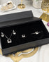 "Baby pink halo crystal jewelry set displayed in black gift box packaging"