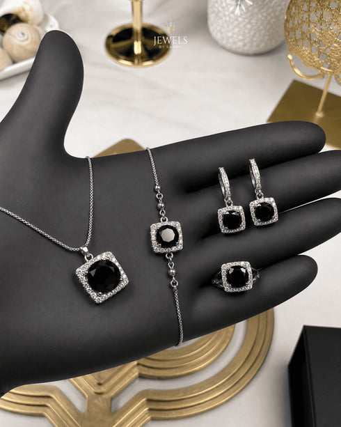 "Jet black halo crystal jewelry set with silver necklace, bracelet, earrings and ring"