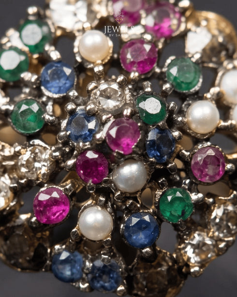 "Close-up of sapphire, ruby, emerald and pearl cluster setting on antique gold ring by Jewels by Sarah"