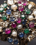 "Close-up of sapphire, ruby, emerald and pearl cluster setting on antique gold ring by Jewels by Sarah"