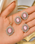 Pink AD stone Jadau pendant set with matching earrings held in hand - Jewels by Sarah Signature Collection