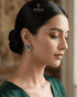 "Model wearing multicolor gemstone antique stud earring styled with green outfit by Jewels by Sarah"