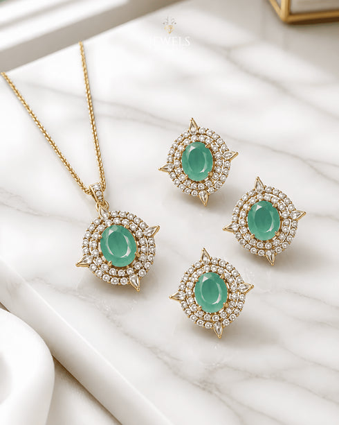 Green AD stone Jadau pendant and ring set on marble background - Jewels by Sarah 22K gold polish
