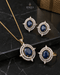 Blue AD stone Jadau pendant set with matching earrings and ring on marble - Jewels by Sarah Signature Collection