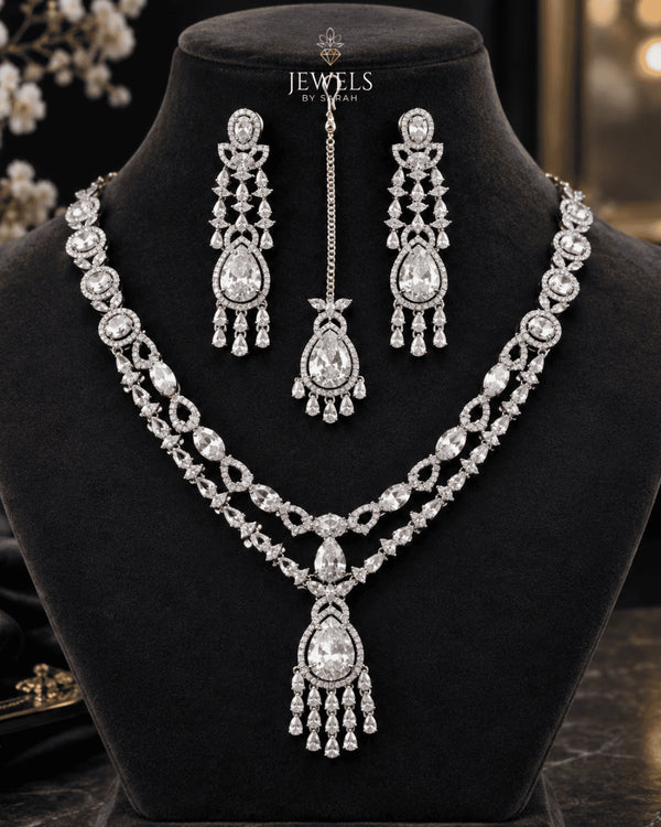 Bridal AD stones silver plated necklace set with tikka on black mannequin