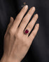 "Model wearing ruby red oval halo statement ring by Jewels by Sarah"