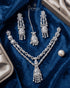 Silver plated original AD stones bridal jewelry set on blue velvet flatlay