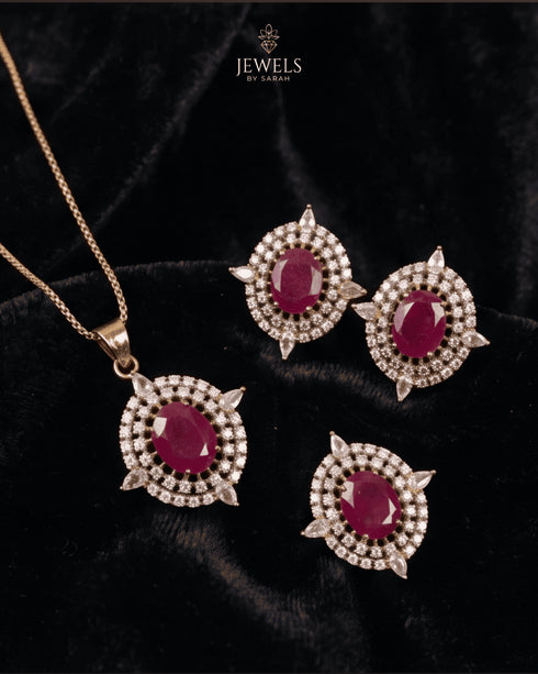 Ruby red AD stone Jadau pendant and earrings set on black velvet - Jewels by Sarah Signature Collection