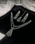 Silver plated mint green and AD stones bridal jewelry set flatlay