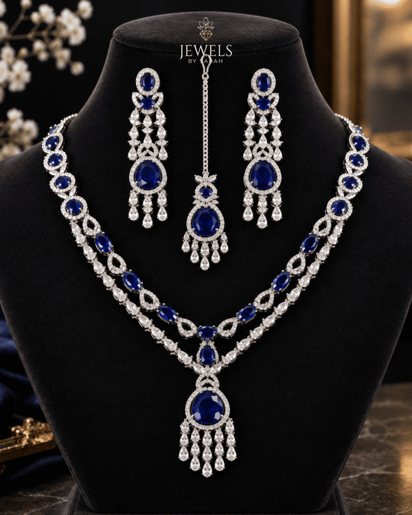 Sapphire blue stone silver plated bridal necklace set with tikka on mannequin