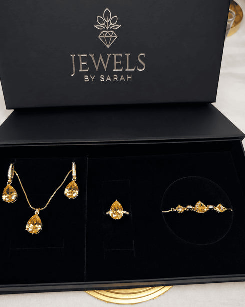 "Jewels by Sarah luxury jewelry gift box with champagne gold crystal necklace, earrings, ring and bracelet"