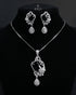 Premium black gemstone pendant set beautifully draped on a luxury matte charcoal mannequin bust under dramatic studio lighting.