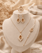 "Champagne gold marquise sunburst jewelry set with necklace, bracelet, earrings and ring"
