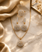 "22K gold plated sunburst zircon necklace set with earrings and ring on marble by Jewels by Sarah"