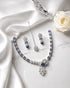 "Royal blue AD bridal necklace set with tikka and earrings on white satin by Jewels by Sarah"